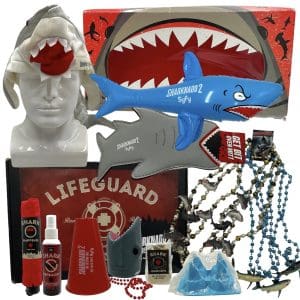 Lot #350: Sharknado 2 The Second One (2014) Promotional Shark Repellent, Umbrella, Fin Ice Mold, Shark Gummies, Shark Necklace Set, Over Mitt, Shark Hat, Shark Inflatable, Party In A Box, Cone & Cup Holder