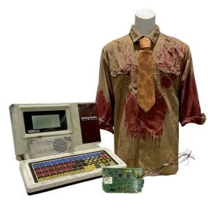 Lot #317: Leatherface Texas Chainsaw Massacre III (1990) Leatherface RA Mihailoff Replica Shirt, Tie & Speak Box