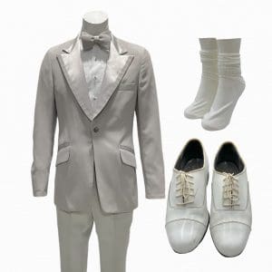 Lot #120: The Iron Claw Mike Von Erich Stanley Simons Screen Worn Suit Jacket, Button-Up Shirt, Pants, Socks, Bow Tie, Cuff Links/ Button Stud Set & Dress Shoes Ch 13 Sc 81-84
