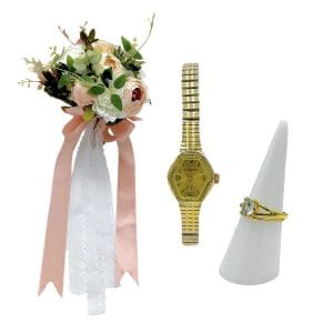 Lot #199: The Iron Claw Pam Lily James Screen Used Wedding Bouquet, Wedding Ring Set & Watch