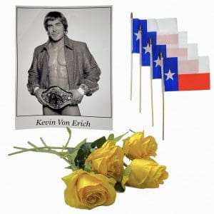 Lot #131: The Iron Claw Kevin Von Erich Zac Efron Screen Used 4 Roses, 4 Flags & Photograph